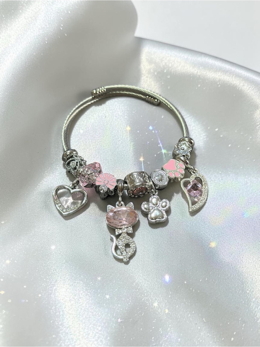 Silver Twisted Bangle Bracelet with Pink Crystal Charms